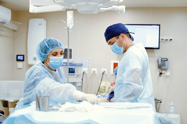 Plastic surgeons in a clinic performing a surgery