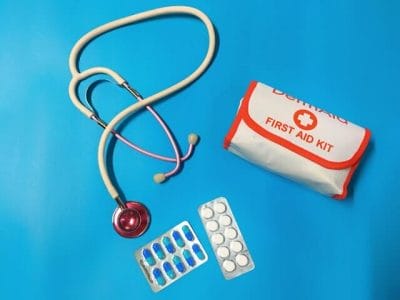 A stethoscope, medicine, and first aid kit used by urgent care centers