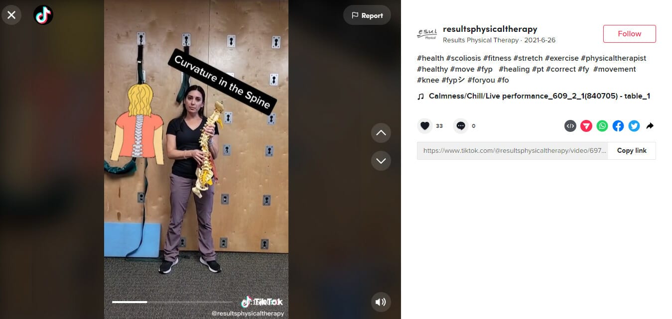 A TikTok video of a physical therapist holding a spine model