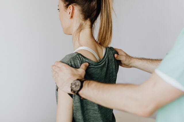 A chiropractor treating a patient's backpain