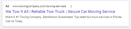 Desktop version of a Google Ad for a towing company