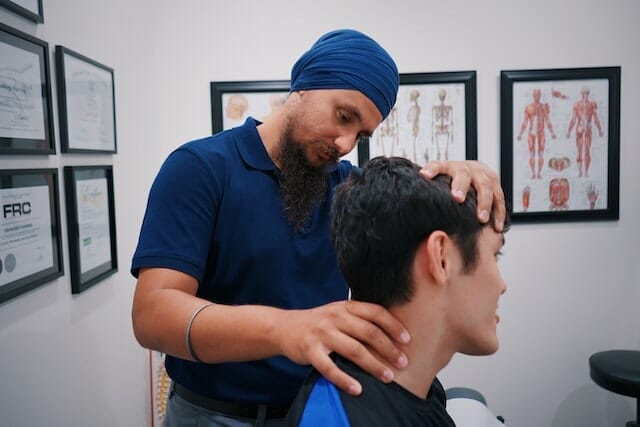 Physical therapist with patient