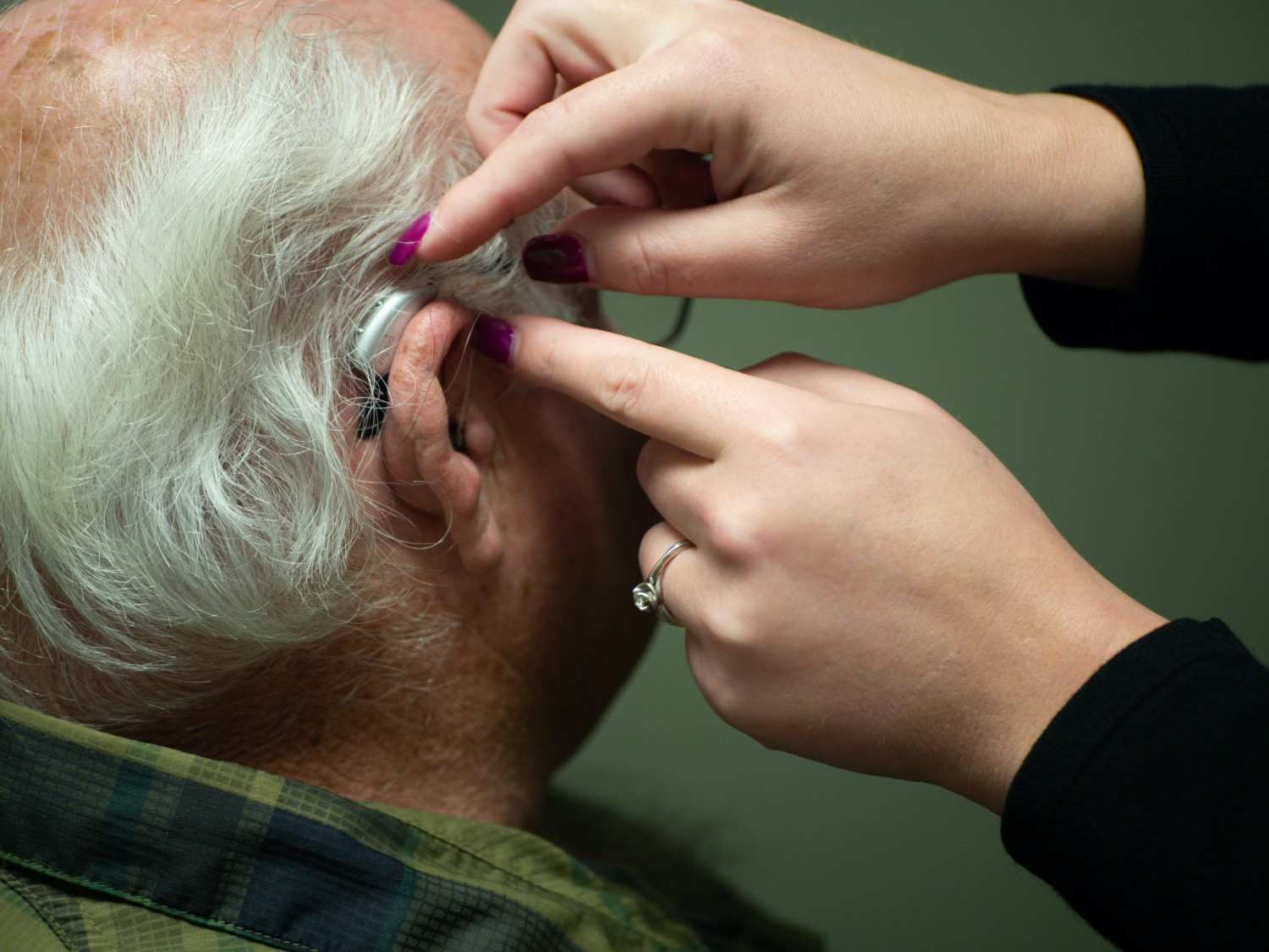 A man given a hearing aid
